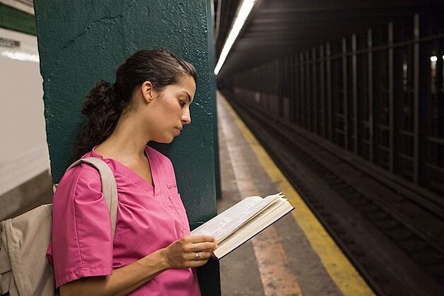 nurse-waiting-subway-reading.jpg
